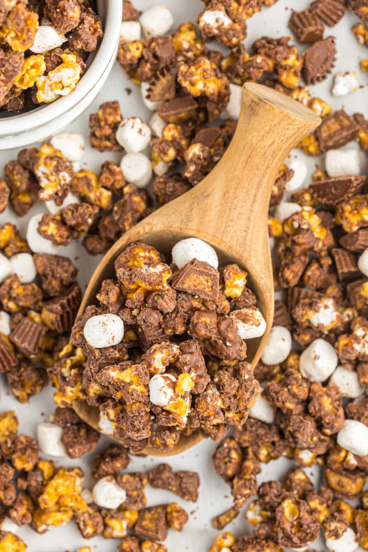 Chocolate and peanut butter caramel corn with marshmallows.