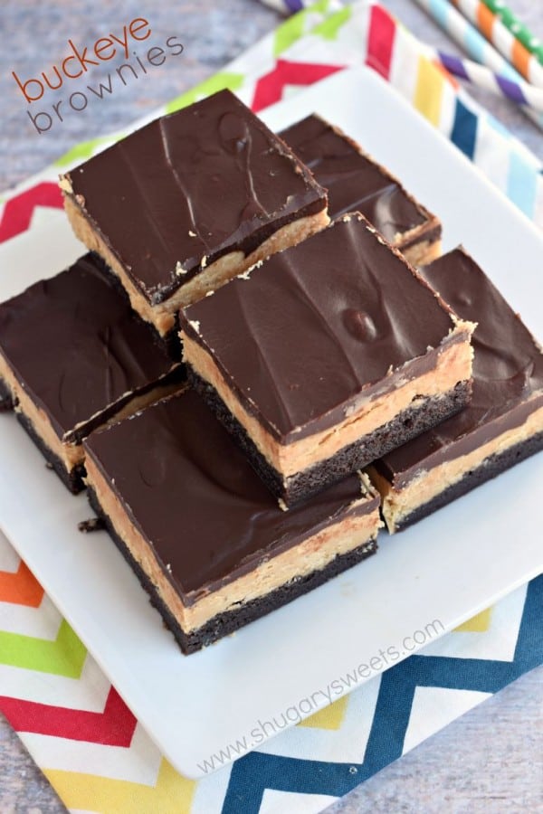 These Buckeye Brownies are amazing! Rich chocolate brownies topped with a homemade peanut butter filling and chocolate ganache.