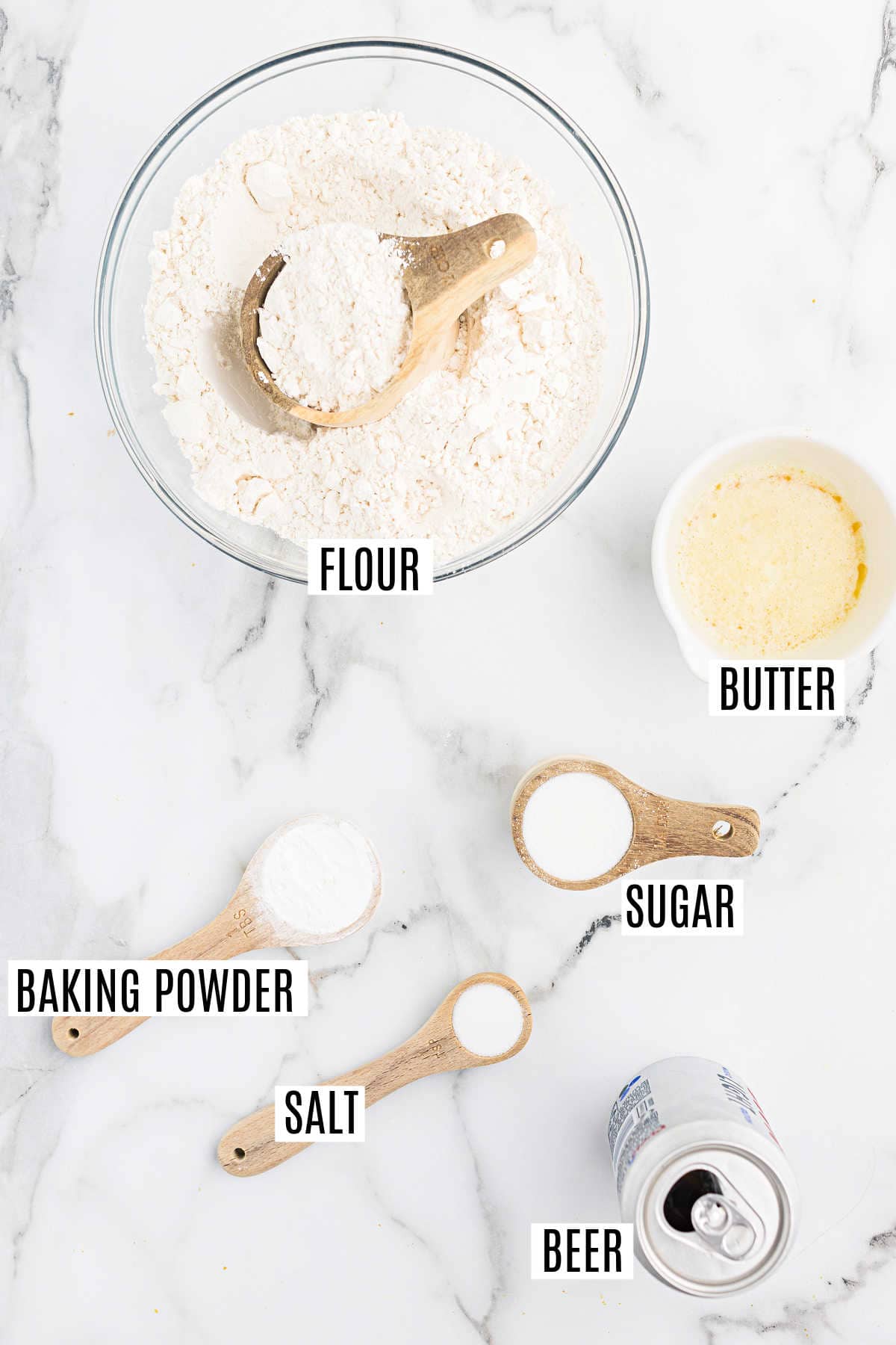 Ingredients needed to make beer bread from scratch.