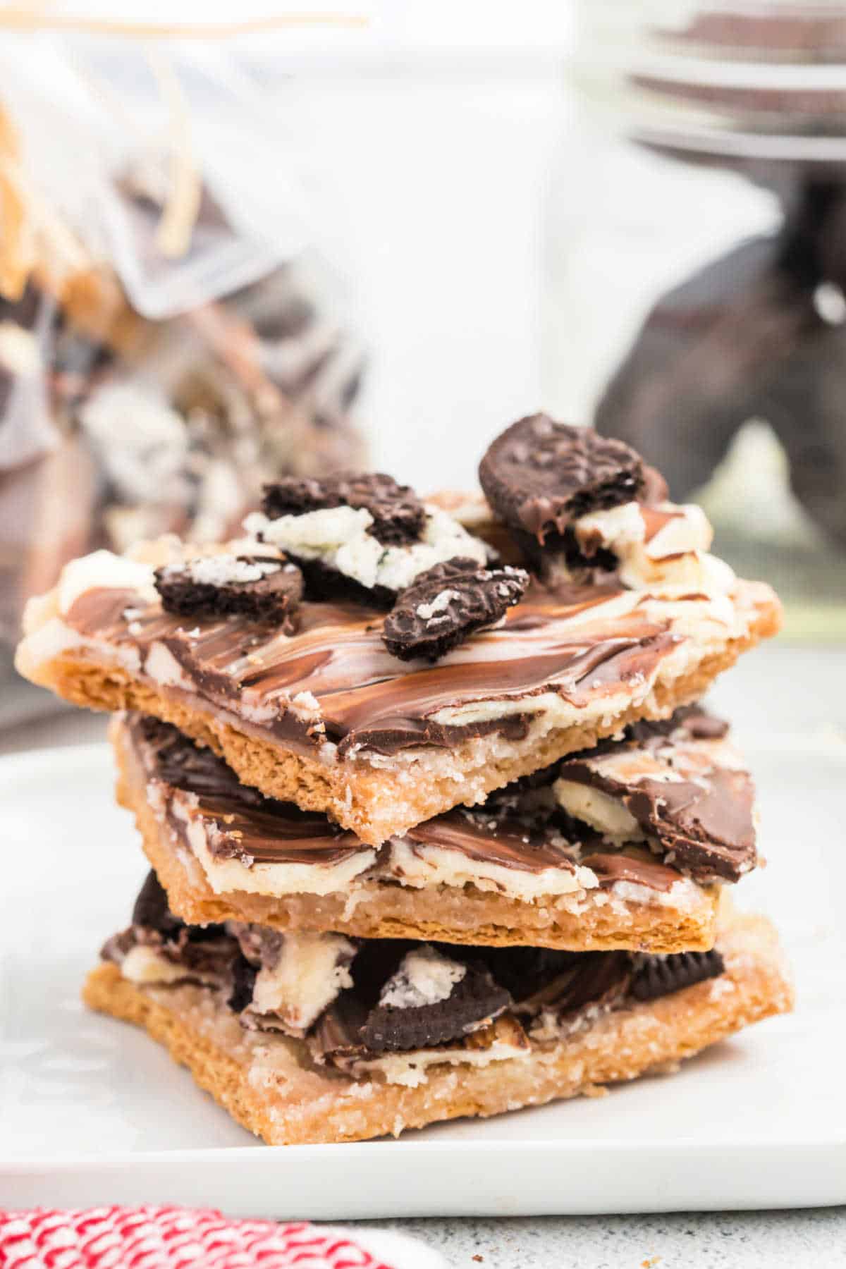 Stack of cracker toffee with Oreos.