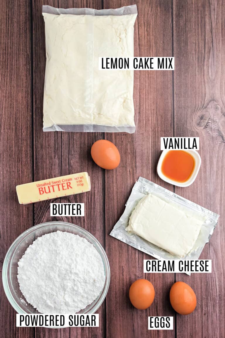 Gooey Lemon Cake Bars Recipe - Shugary Sweets
