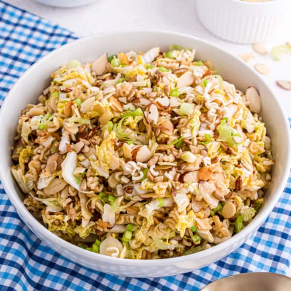 Looking for the perfect potluck recipe? This Chinese Coleslaw with ramen noodles is crunchy, sweet and bursting with irresistible flavor. It's the perfect pick to feed a crowd.