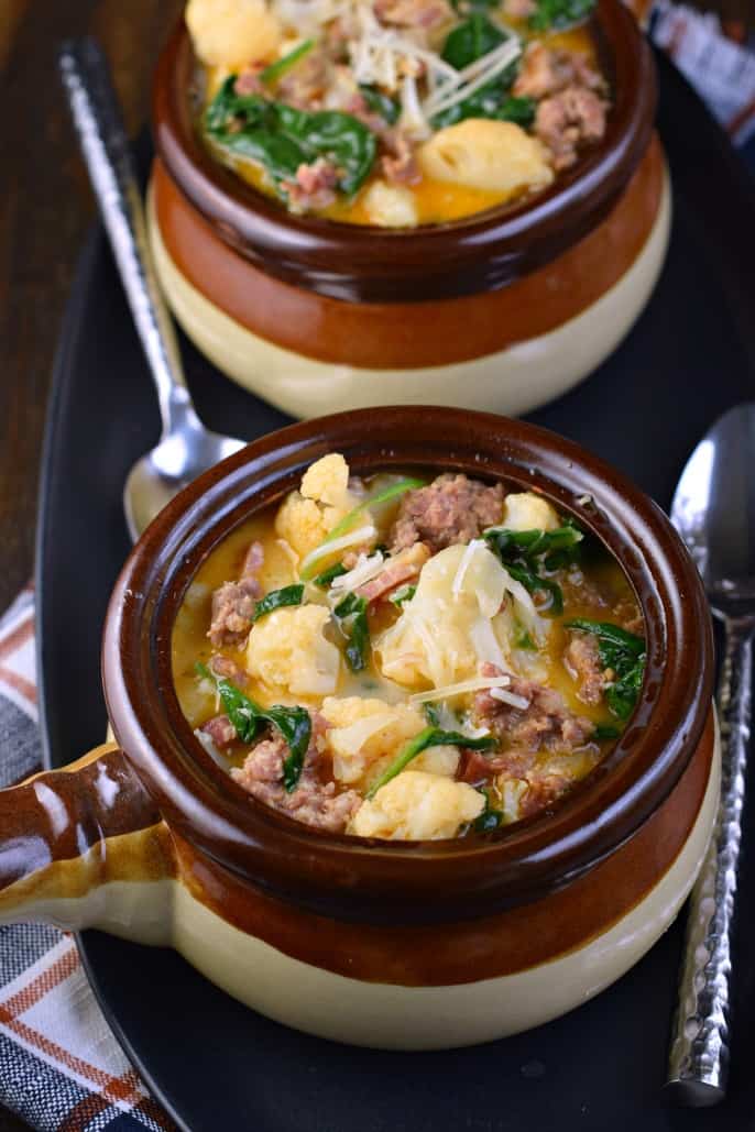 Bowl of Low Carb Zuppa Toscana Soup with cauliflower and spinach.