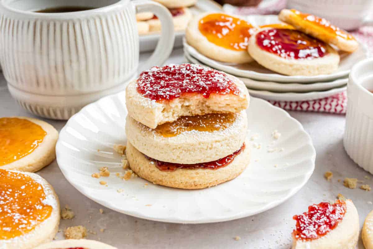 These simple Polish Kolache Cookies for Christmas feature a soft cookie base and a topping of sweet fruit preserves. Don’t forget the extra powdered sugar!