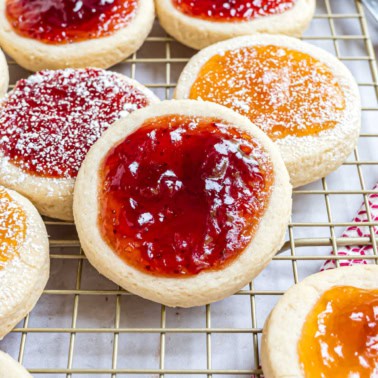 These simple Polish Kolache Cookies for Christmas feature a soft cookie base and a topping of sweet fruit preserves. Don’t forget the extra powdered sugar!