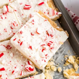 This Peppermint Cracker Toffee is ridiculously easy and delicious. Crisp, buttery toffee topped with white chocolate and peppermint candy! Give it as a gift this Christmas or keep it all to yourself.