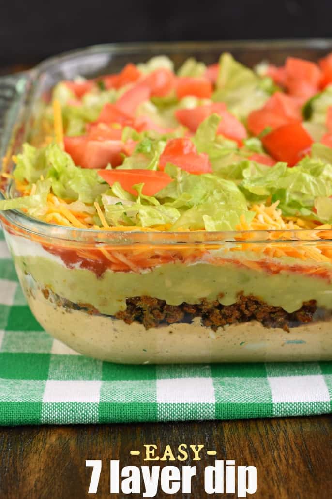 7 Layer dip in a clear glass serving dish.