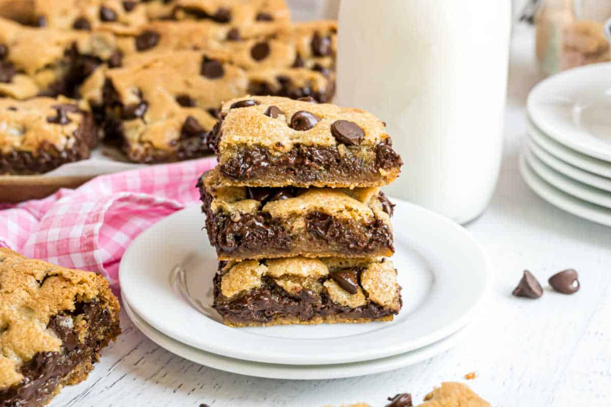 Stack of three chocolate chip cookie bars.