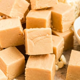 The Best Peanut Butter Fudge recipe with no candy thermometer needed. Soft and creamy and packed with peanut butter flavor, this is the easiest peanut butter fudge ever!