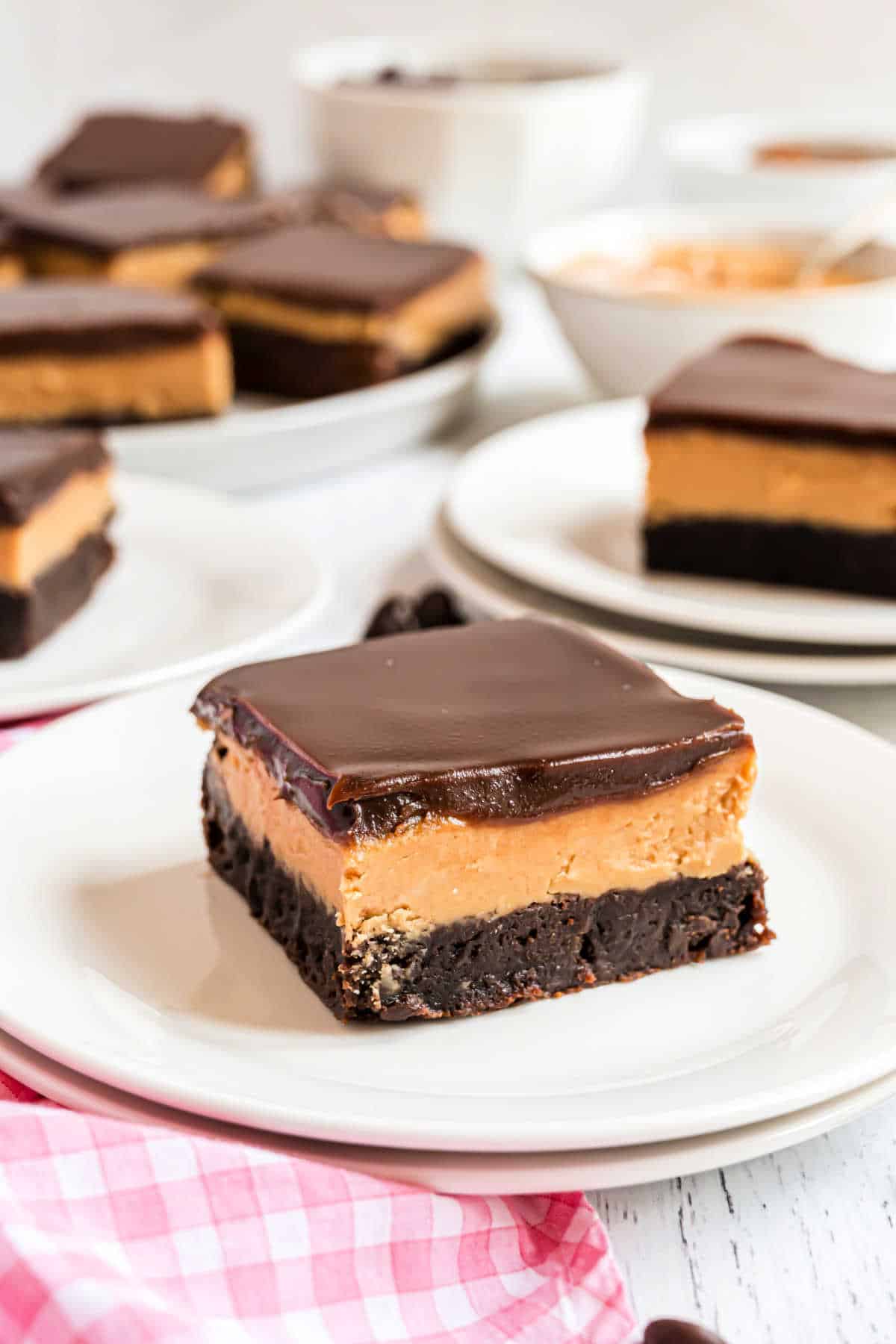 Buckeye brownies plated on small white plates.