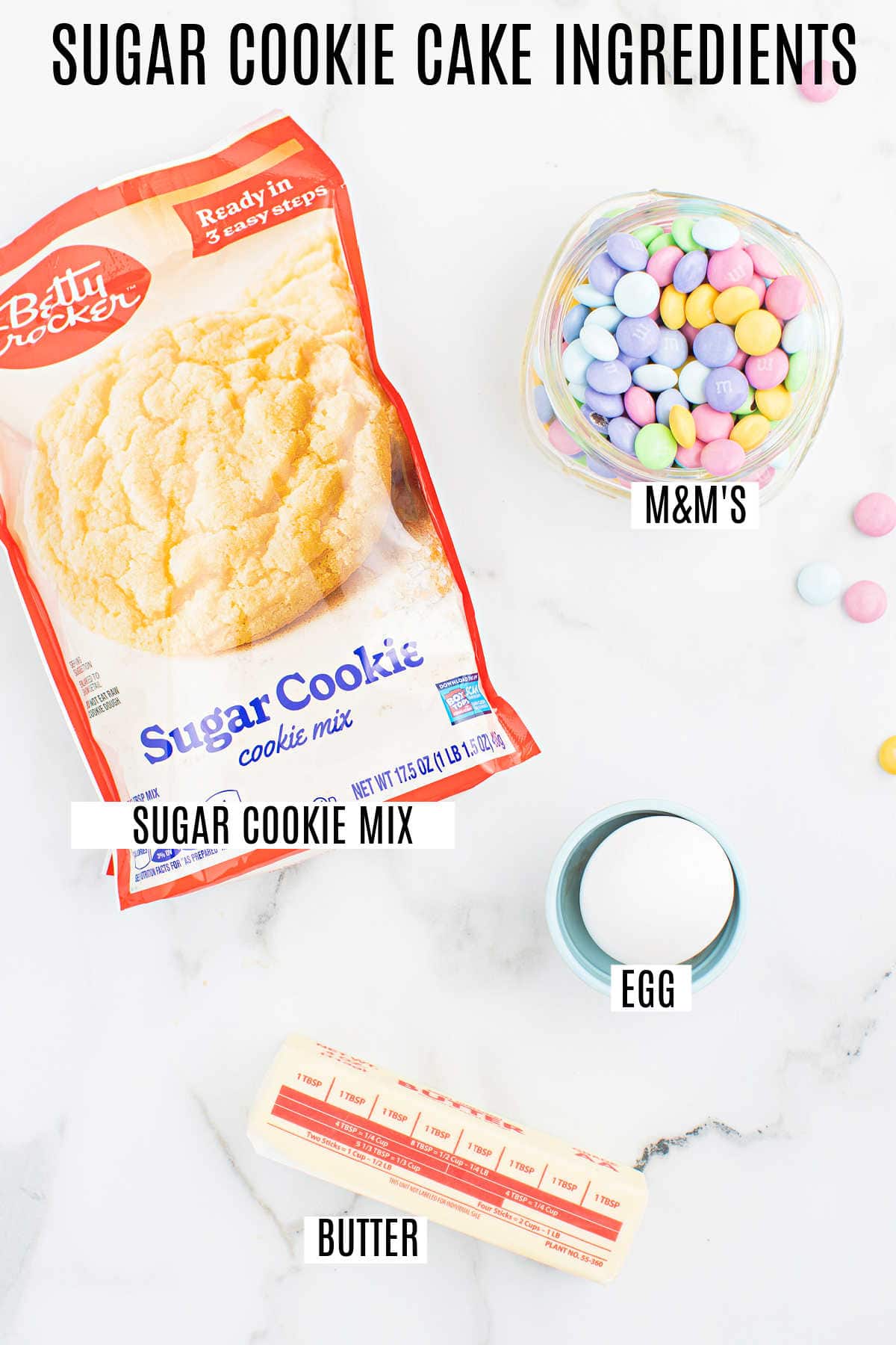 Ingredients needed to make sugar cookie cake.