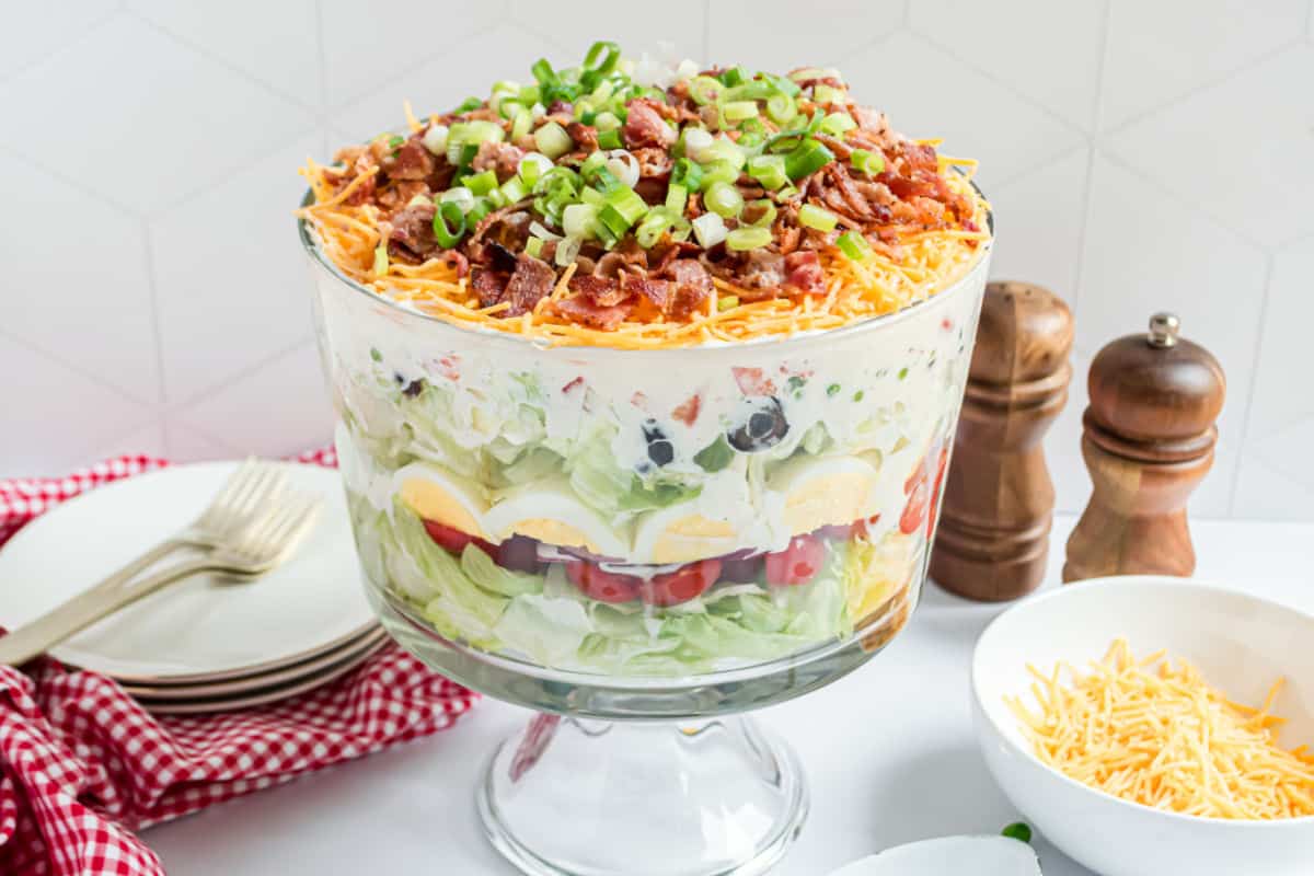 https://www.shugarysweets.com/wp-content/uploads/2021/04/7-layer-salad-facebook.jpg