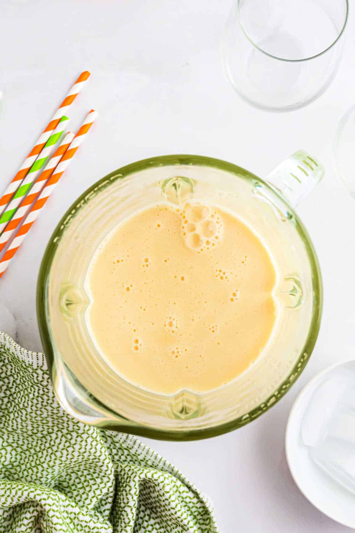 Orange julius in a blender with ice.