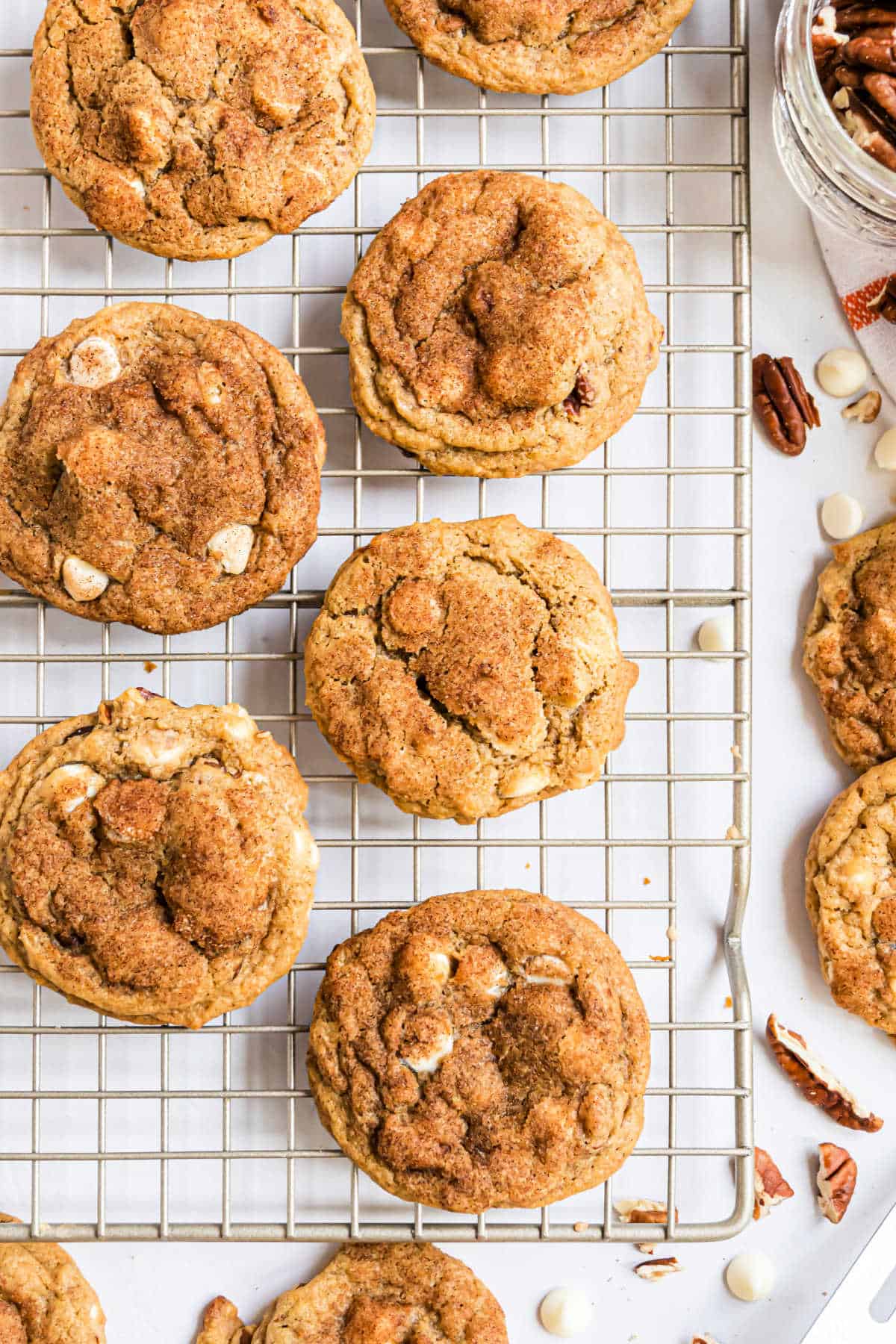 Pumpkin cookies on a wire cooling rack.