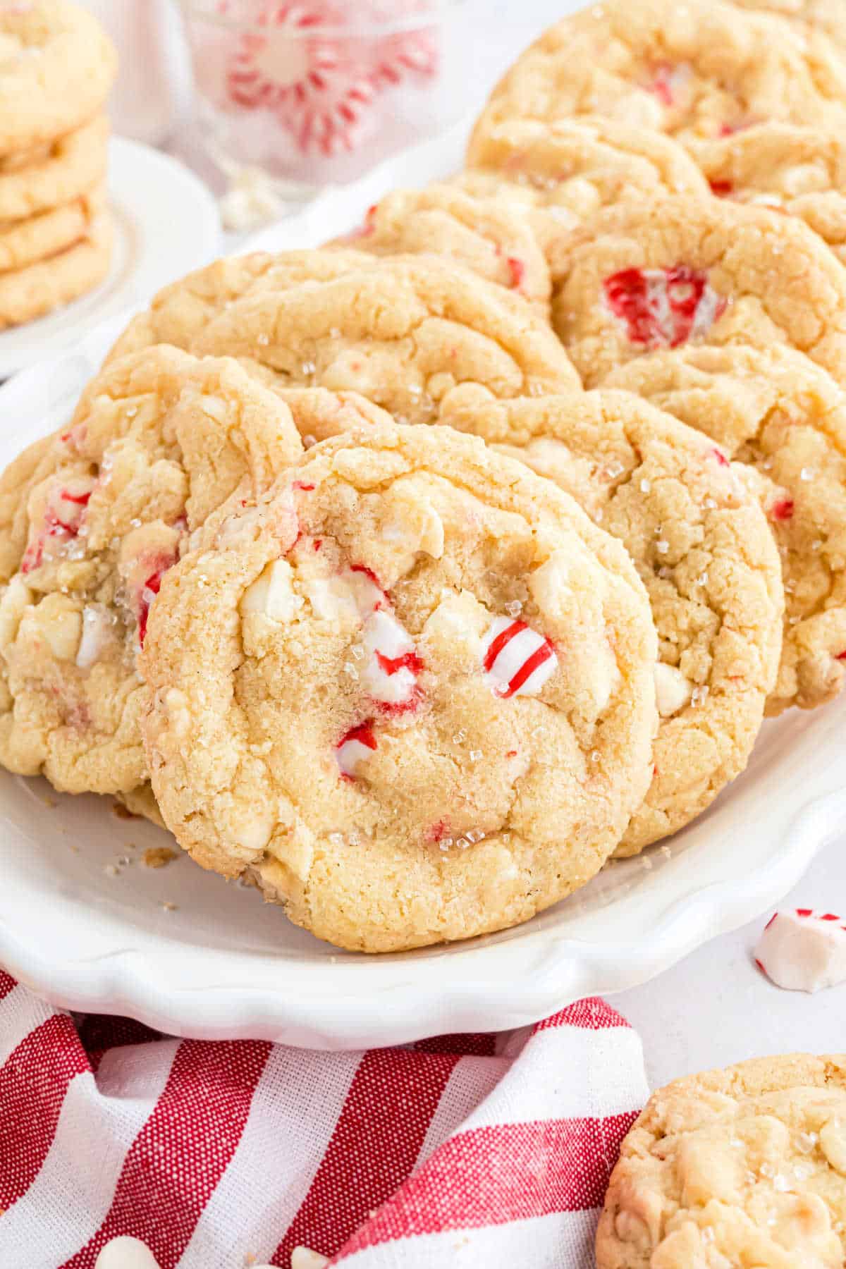 White chocolate cookies with peppermints on a white plate.