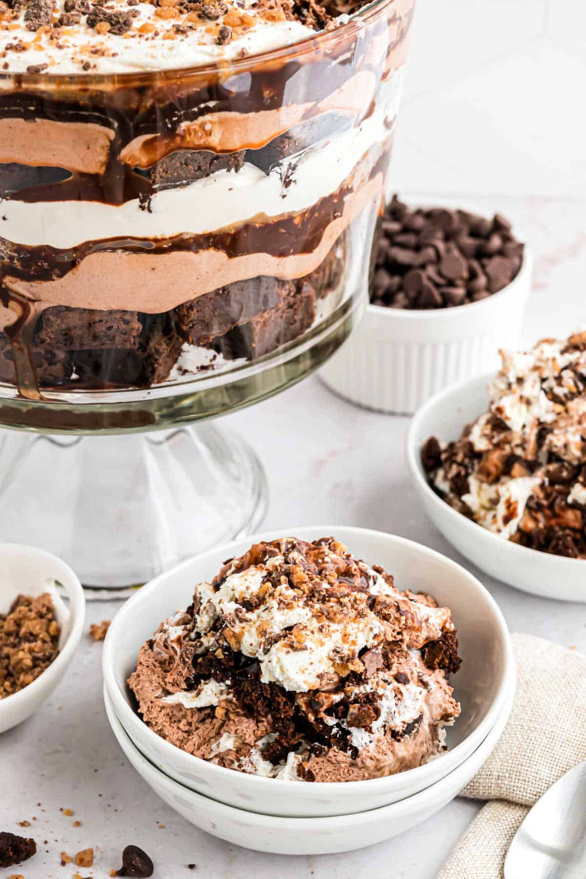 Brownie trifle served in a white bowl.