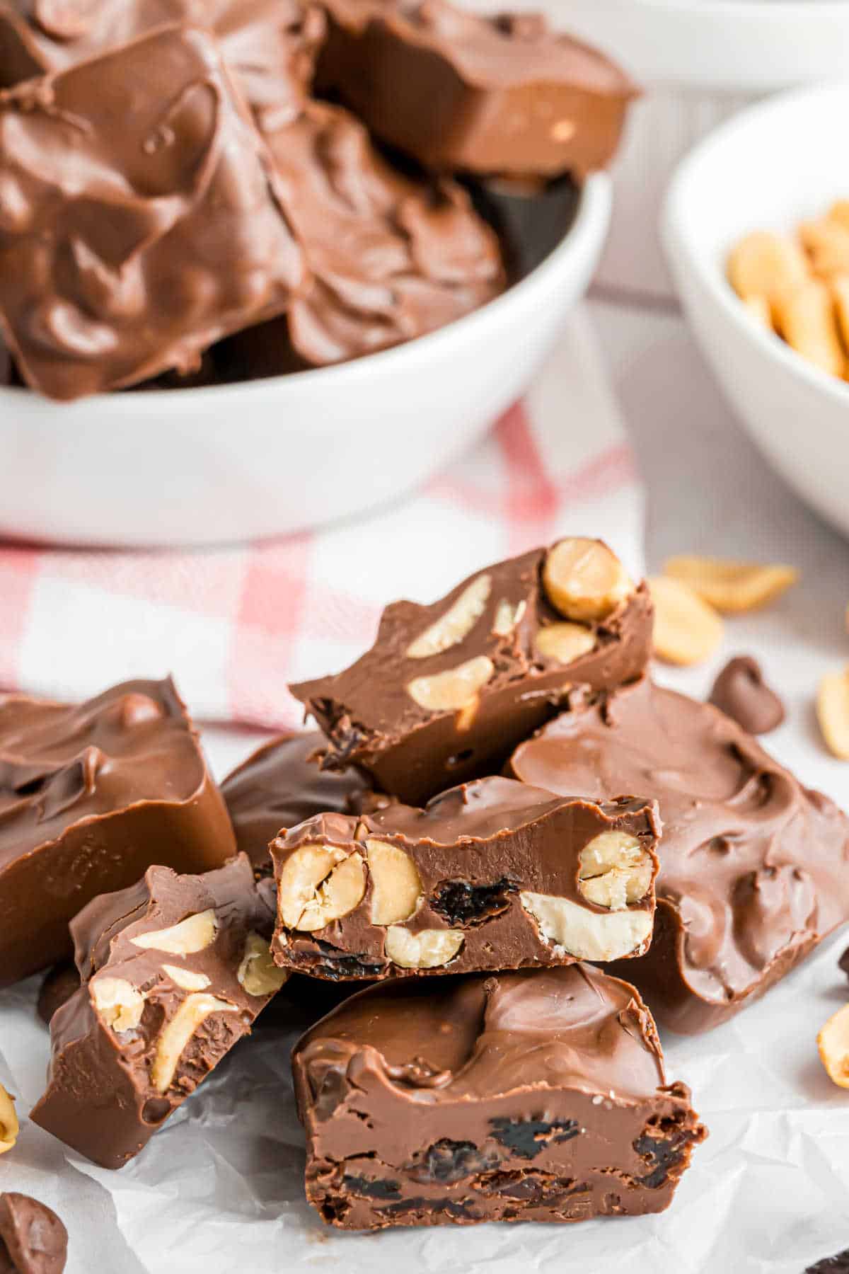 Chunky candy bars served on parchment paper.