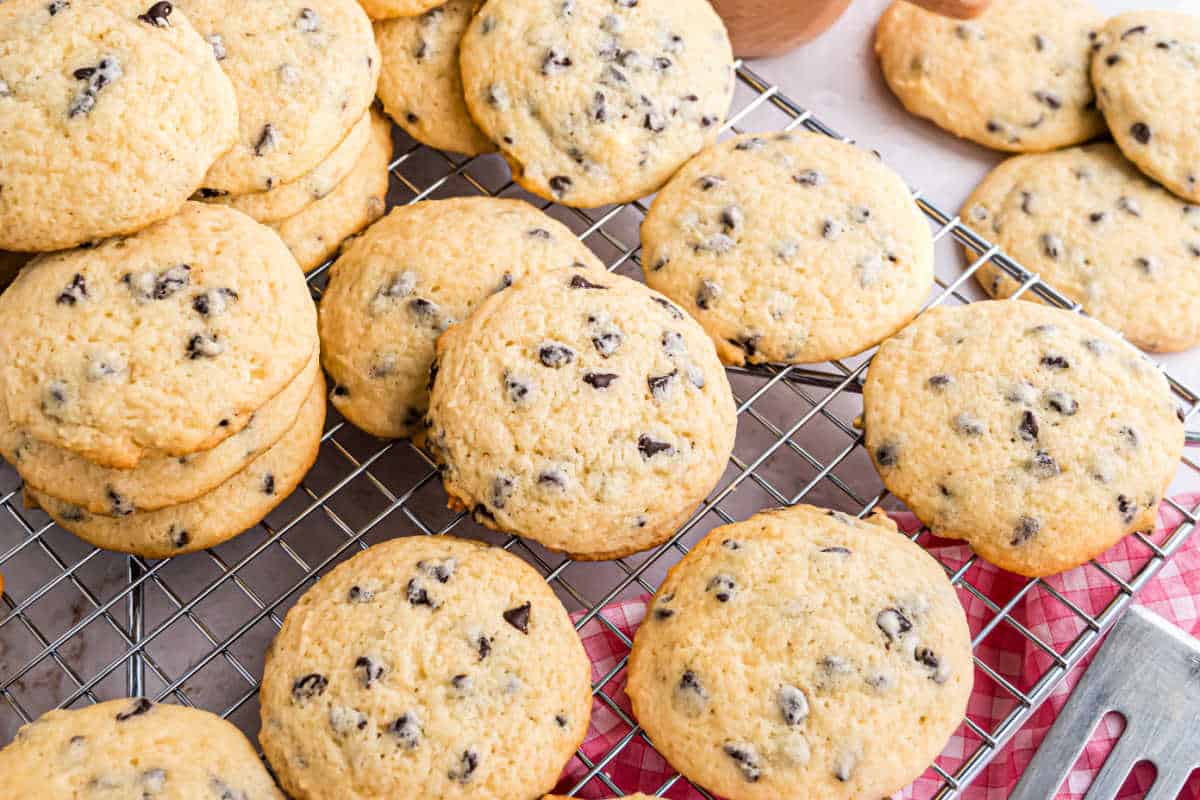 Cookies stacked on a wire rack.