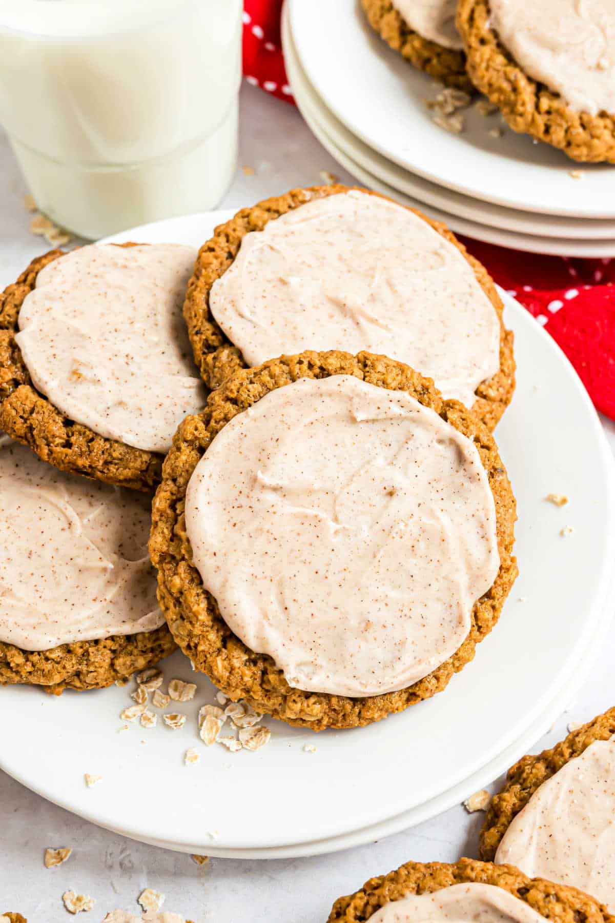 Iced gingerbread oatmeal cookies on a serving plate.