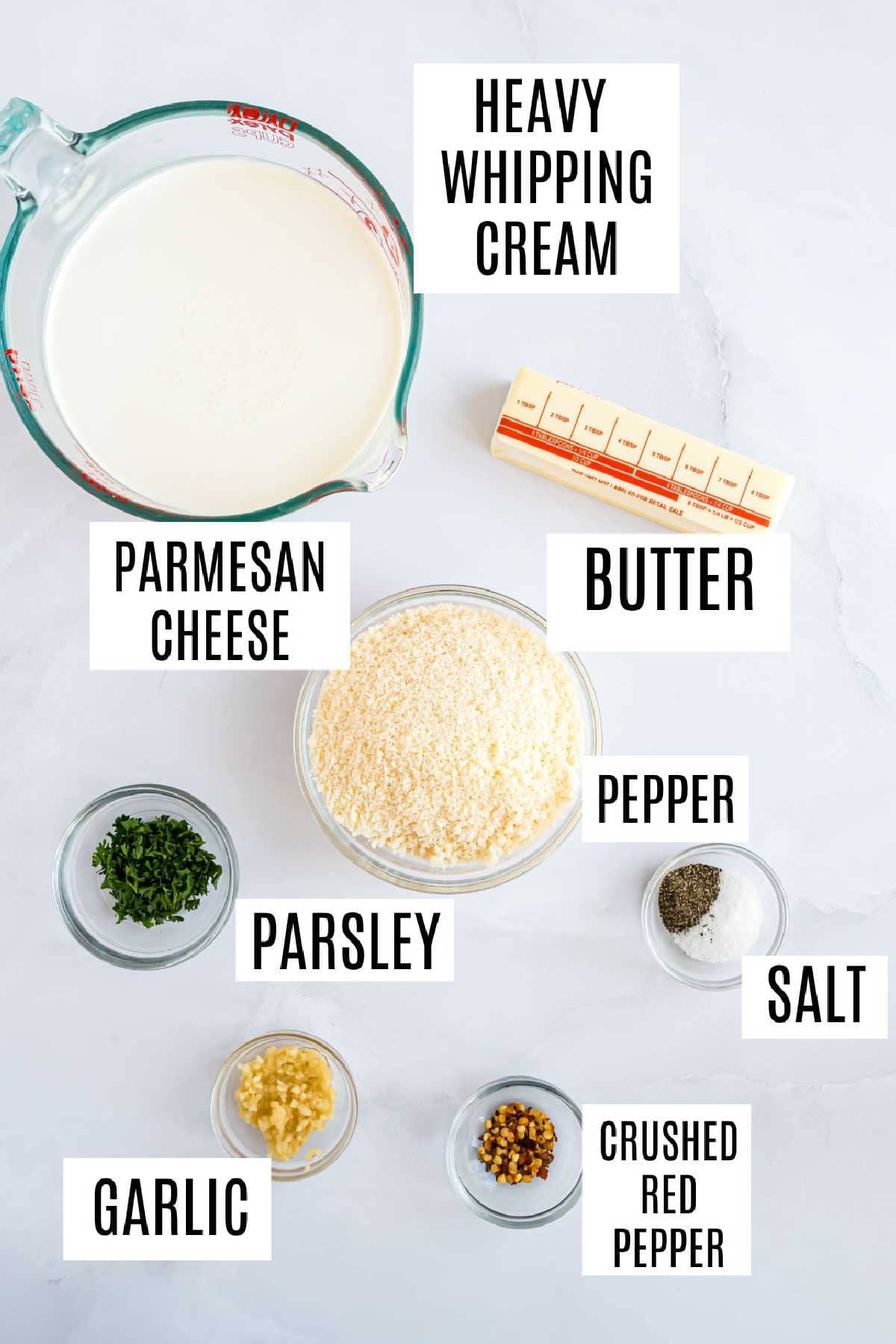 Ingredients needed to make homemade alfredo sauce.
