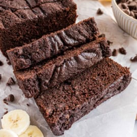 Double Chocolate Banana Bread is the perfect recipe for chocolate lovers and anyone who likes their banana bread moist and rich! With cocoa-infused batter and milk chocolate chips, it’s going to be your favorite way to use ripe bananas! I've even included the recipe to make these into muffins.