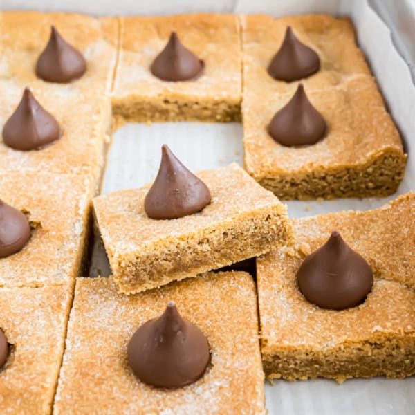 If you love the classic cookie, you’ll also love these Peanut Butter Blossom Bars! Chewy peanut butter cookie bars are topped with chocolate Hershey’s Kisses.